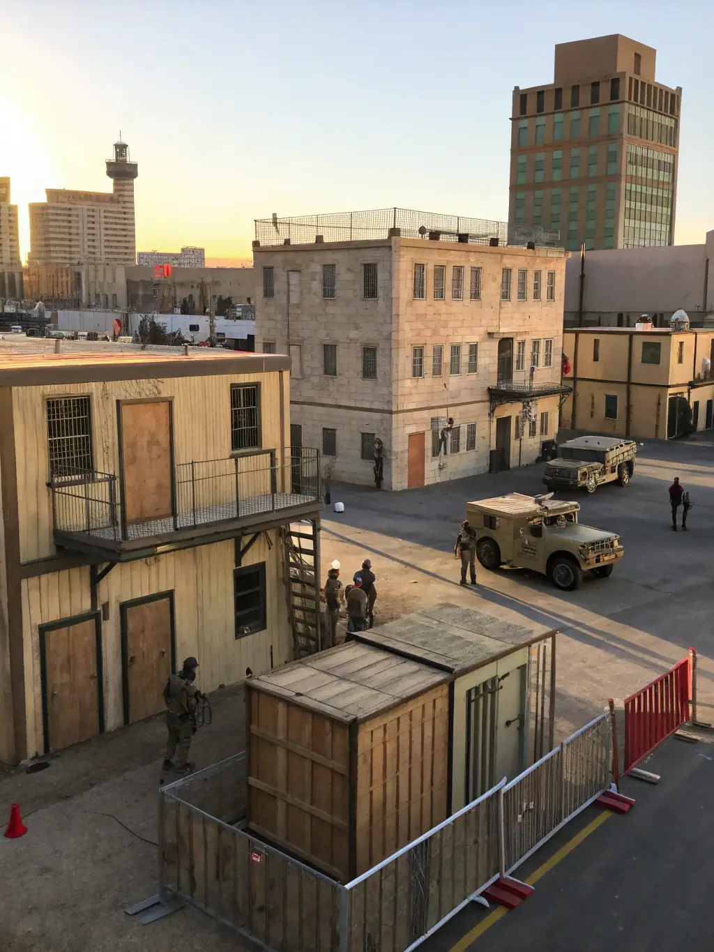 A photo of instructors in tactical gear demonstrating a close-quarters combat technique, emphasizing real-world application and expertise.